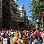 Thousands of people on street celebrate the football victory