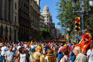 Thousands of people on street celebrate the football victory